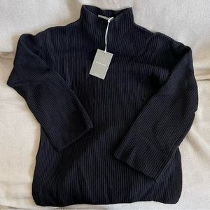 Everlane black cashmere mock-neck sweater